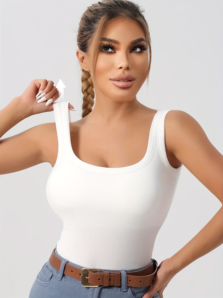 Blusa con sujetador incorporado y tirantes ajustables
